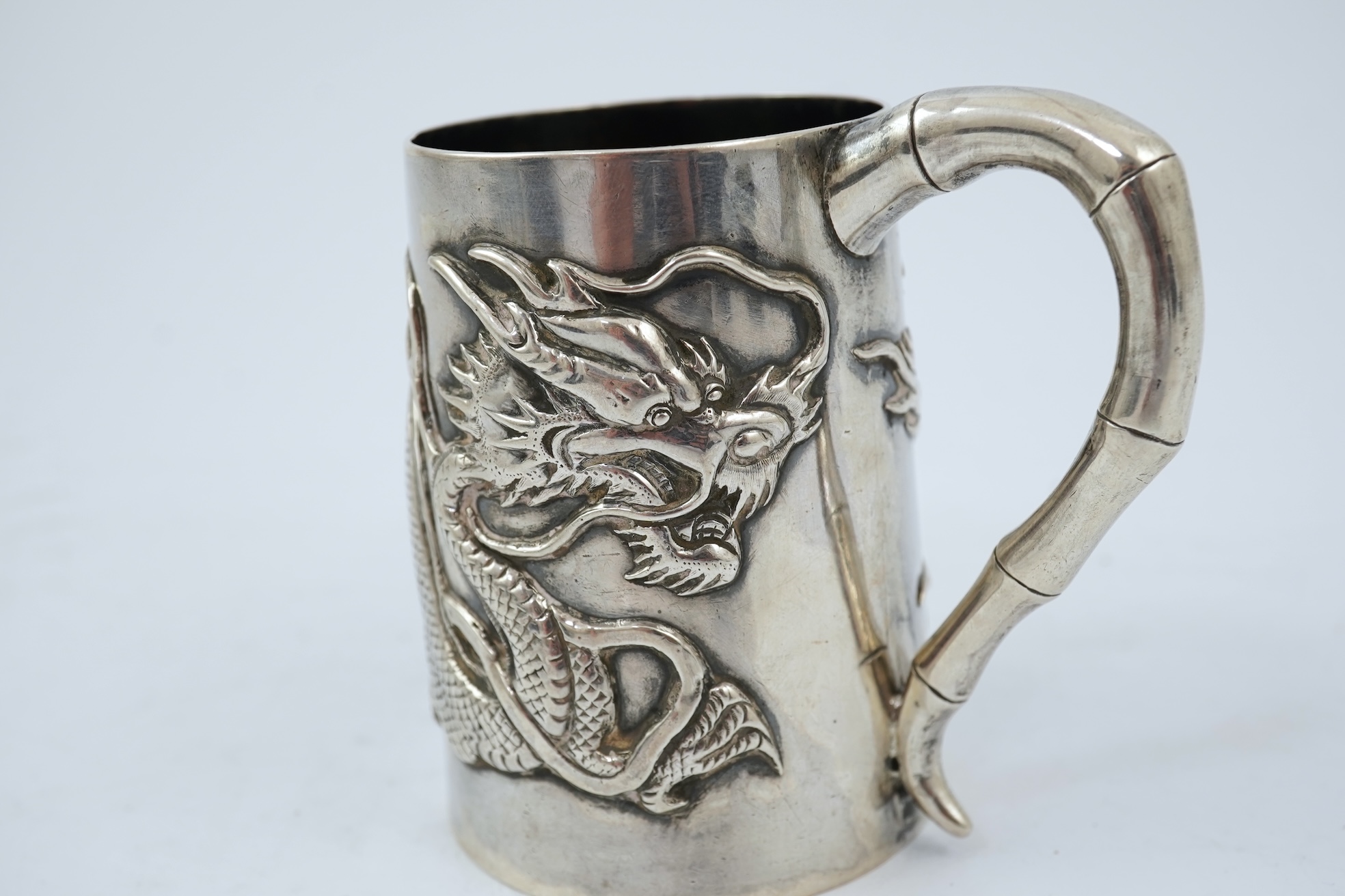 A late 19th/early 20th century Chinese Export silver small mug, by Wang Hing, Hong Kong